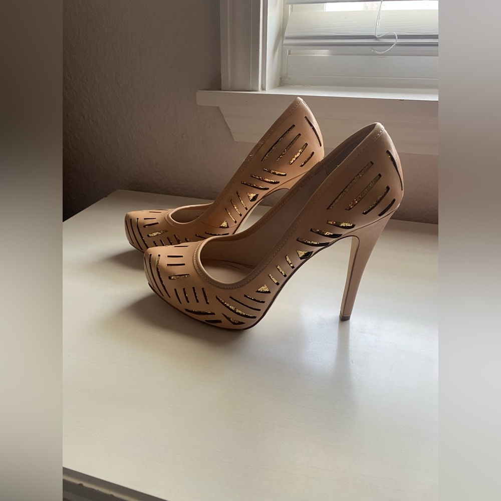 BCBGeneration nude and gold platform heels